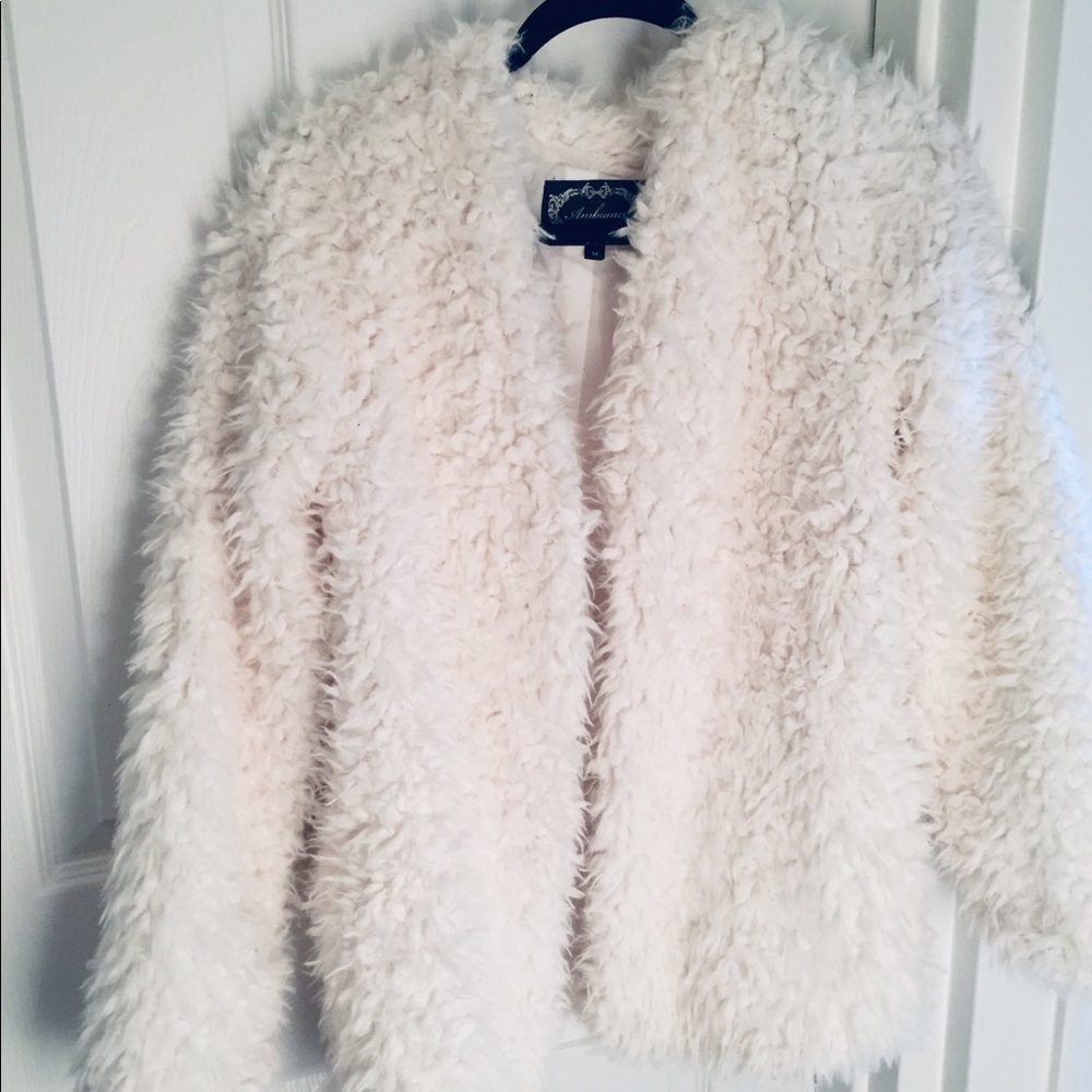 Fluffy white faux fur coat